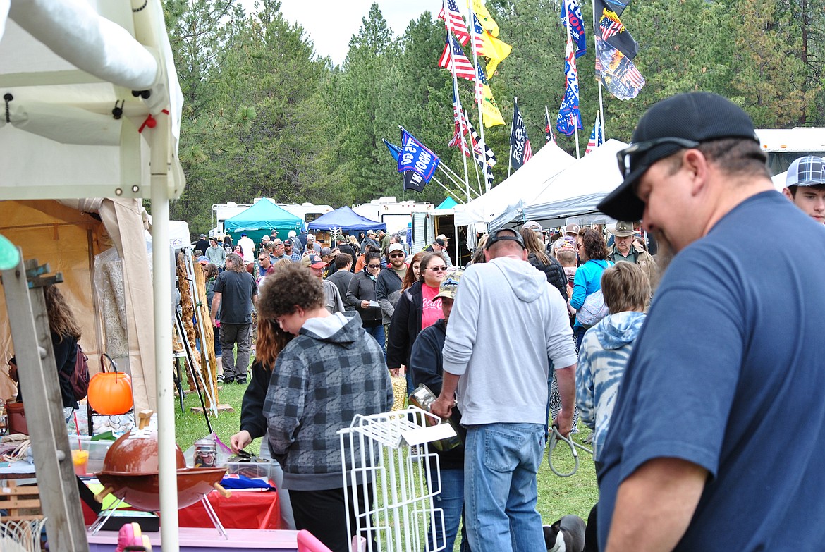 Hundreds of people gathered at the St. Regis Community Park over Memorial Day weekend for the 45th annual St. Regis Flea Market. The rain held off for most of the day as hagglers, hunters, and treasure seekers walked the grounds under overcast skies. The park was brimming full of bargains, and booths galore of eclectic items, kettle corn, lemonade, antiques, dog walkers, and in every row you could find friends catching up and socializing. (Amy Quinlivan/Mineral Independent)