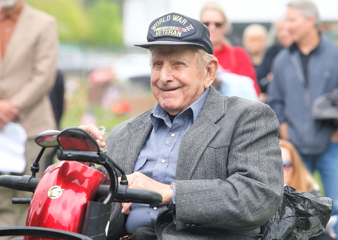 Veteran Leo Benoit smiles during Sunday's Memorial Day ceremony at St. Thomas Cemetery.