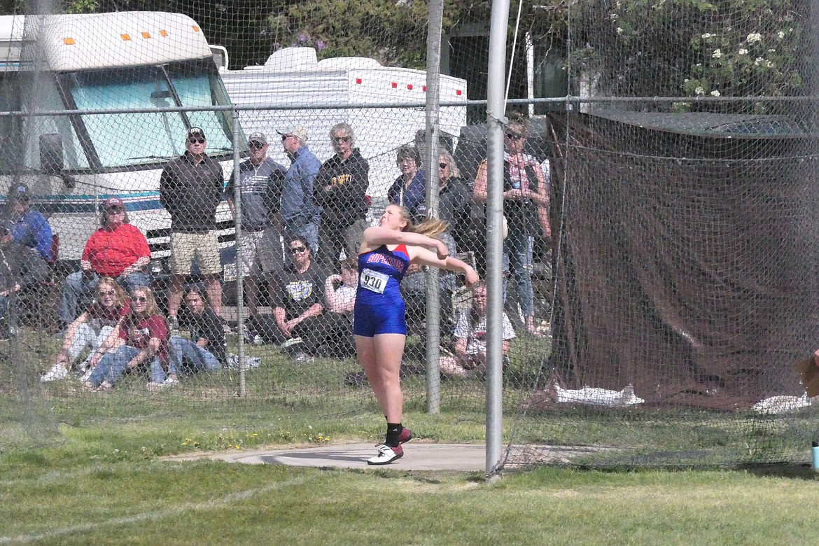Superior senior Cassie Green let the discus fly during finals of the Class C Discus event during Saturday's Montana BC state finals in Great Falls.  (Chuck Bandel/MI-VP)