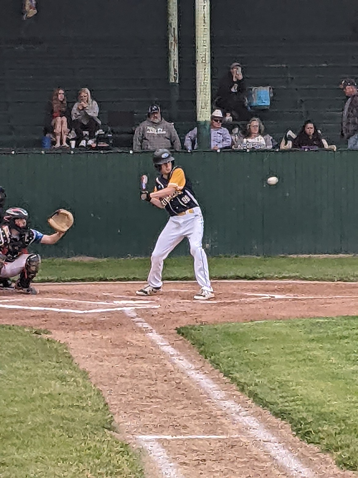 St. Regis player Tanner Day swings at an incoming pitch during this past week's game against the Libby Loggers in Libby.  The Loggers won 6-3.  (Photo by coach Jon Zigler)