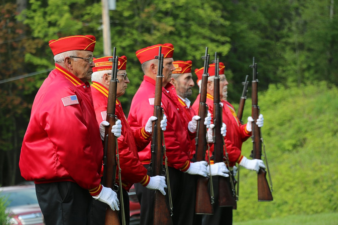 Members of the Marine Corps League stand at attention as they take part in Monday's Memorial Day tribute.