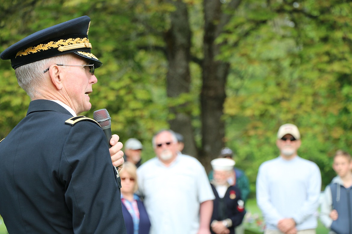Bryan Hult, a retired U.S. Army brigadier general and Bonner County Veterans Services officer, talks to those gathered for Memorial Day services about how "The Star Spangled Banner" came to be the country's national anthem.