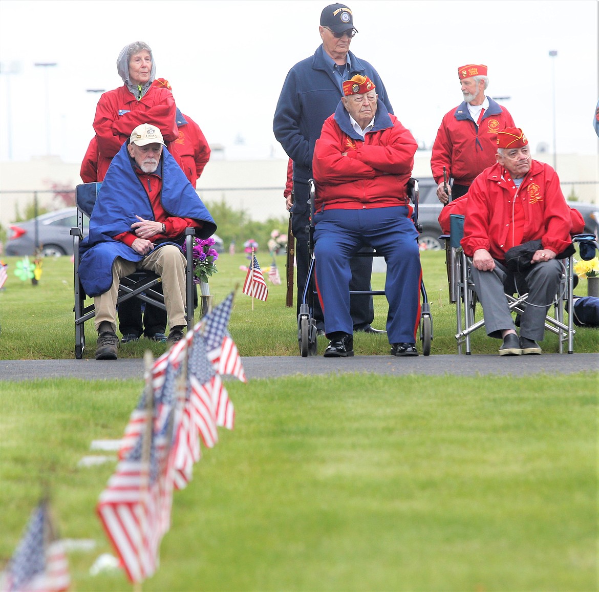 Veterans Jim Mangan, Mac McCormick and Ivan Bishop listen during the Memorial Day ceremony at Coeur d'Alene Memorial Gardens.