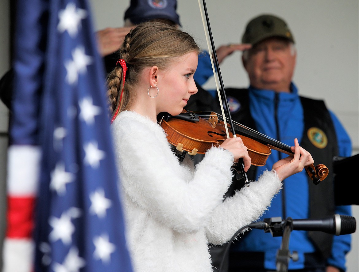 Paige Dance performs "The Star-Spangled Banner” on Monday at McIntire Family Park.