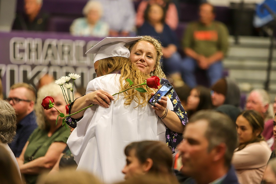 Kyla Tomlin gives her mom a hug at the Charlo High School graduation on May 29, 2022. (JP Edge/Hungry Horse News)