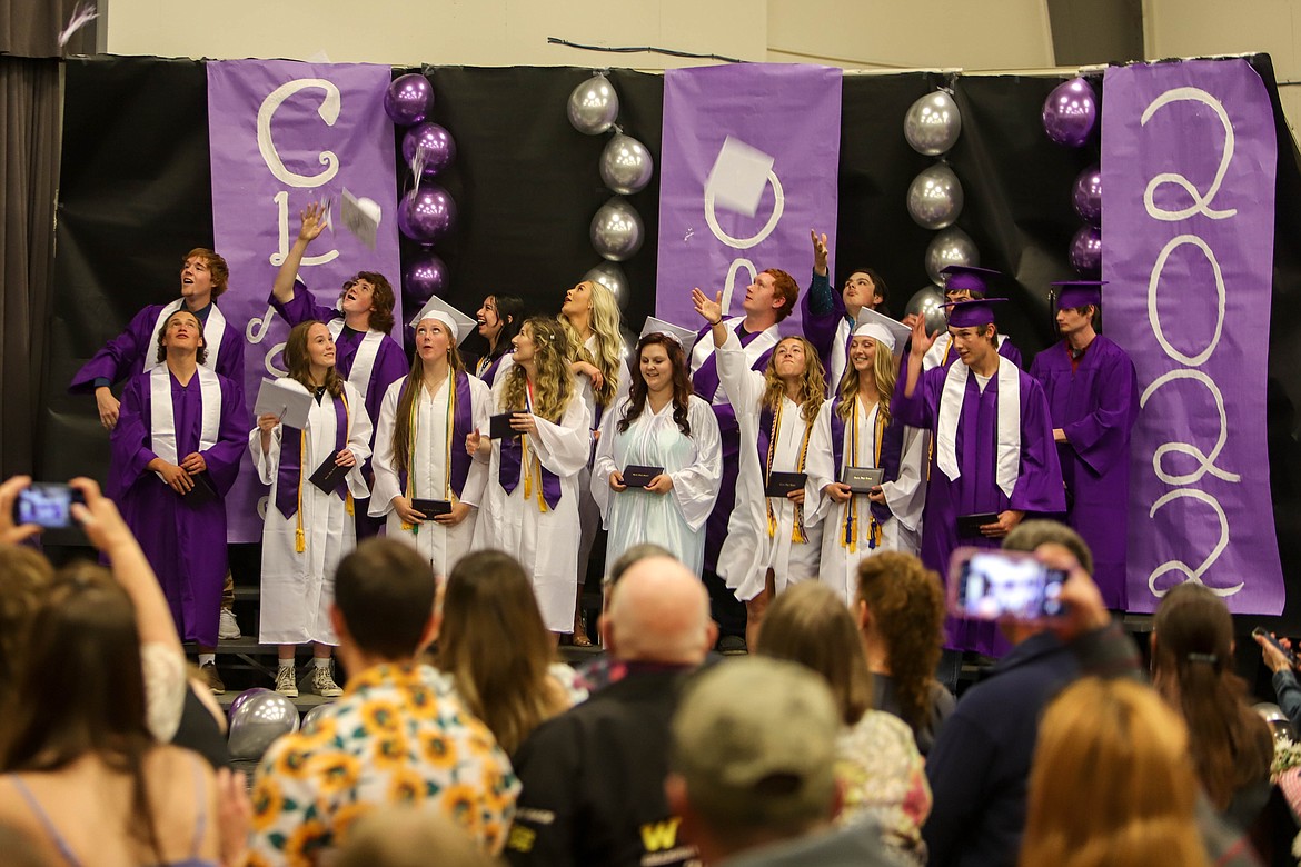 The Charlo high school 2022 graduating class, first row from left, George Ranney, Mona Reich, Jessica Shenyer, Molly Kate Sullivan, Brandi Thompson, Kyla Tomlin, Katelyn Young; second row, Noah Anderson, Anthony Castro, Guinevere Contras, Kassidi Cox, Colt Hovet, Ethan Morrison, Coyle Nagy and William Phillips. (JP Edge/Hungry Horse News)