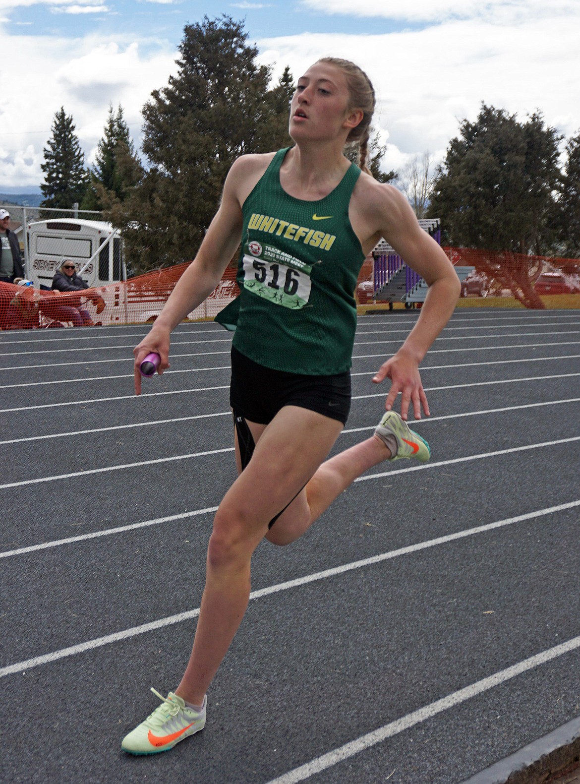 Bulldog Brooke Zetooney runs in the 4X400 relay at the State A meet last week in Butte. Zetooney claimed titles in the 100 meter, 200 and ran in both state-winning relays. (Matt Weller photo)