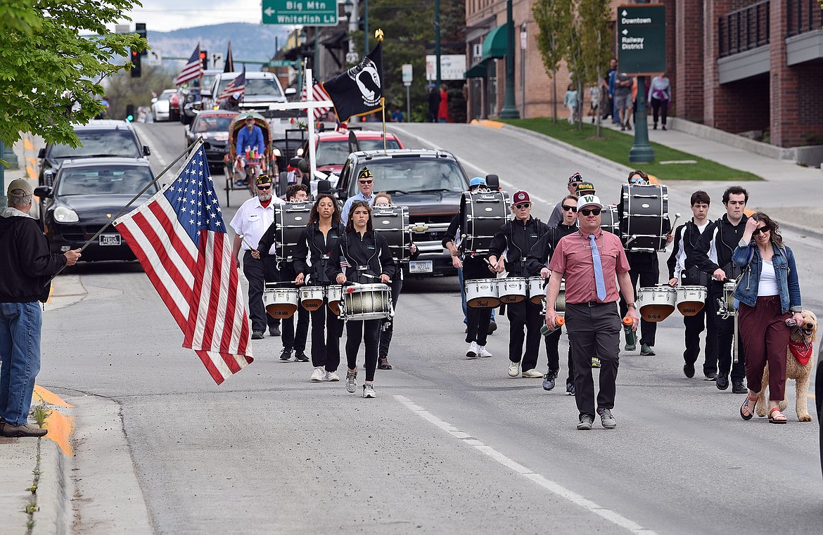 The Whitefish High School drumline leads the Memorial Day Parade down Second Street on Monday afternoon. (Whitney England/Whitefish Pilot)