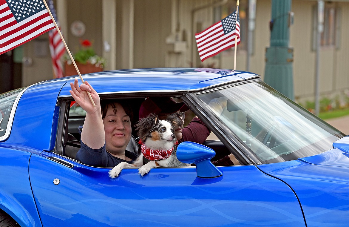 A patriotic corvette drives in the Memorial Day Parade on Monday in Whitefish. (Whitney England/Whitefish Pilot)