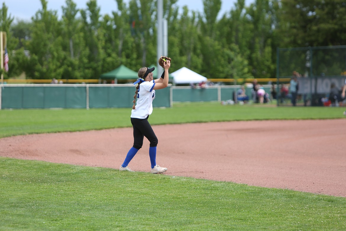 Warden junior Kaylee Erickson catches a fly ball in the infield during the 2B state tournament on May 27, 2022.