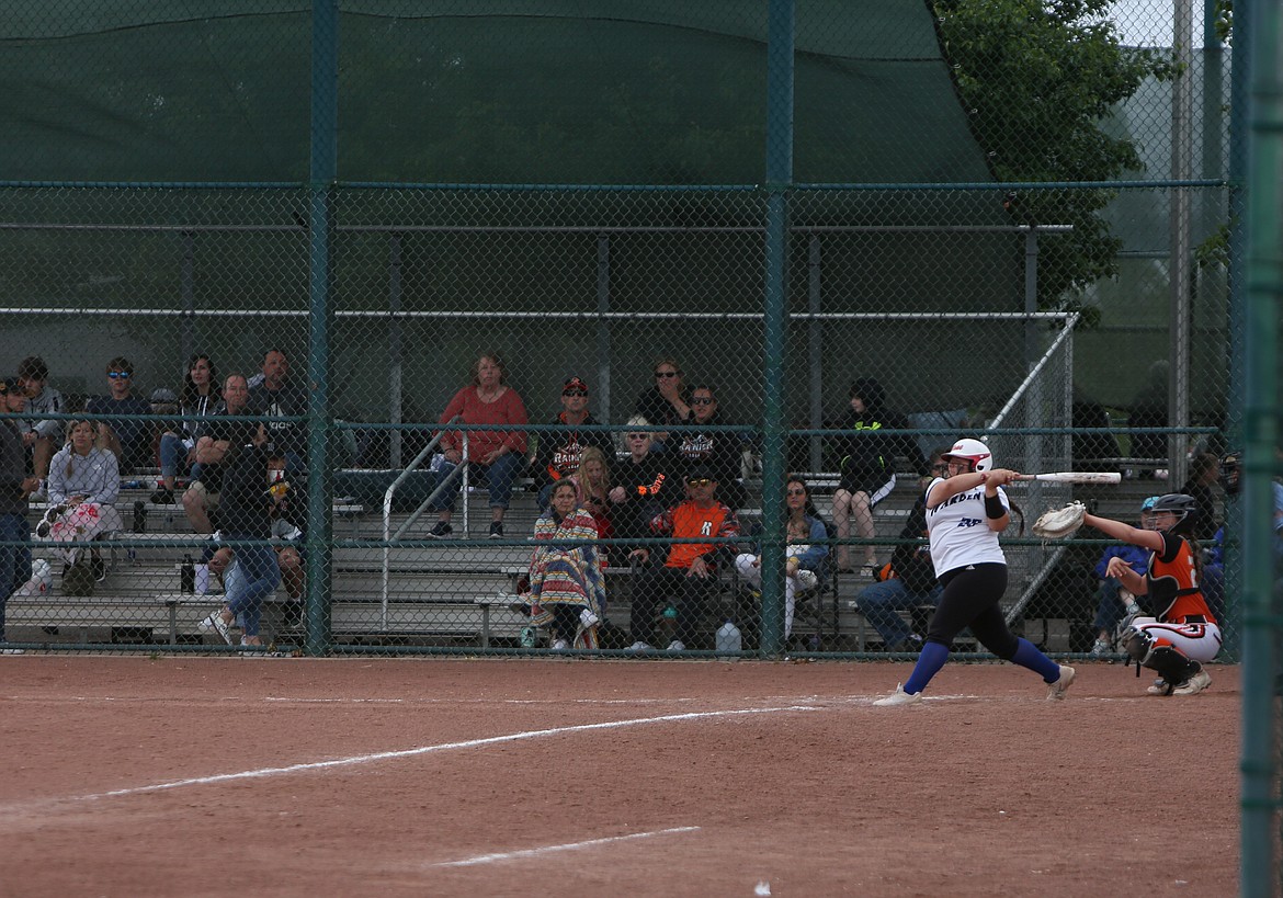 Warden freshman Genesis Ozuna swings at a pitch in the sixth inning of Warden’s 16-2 loss to Rainier on May 27, 2022.