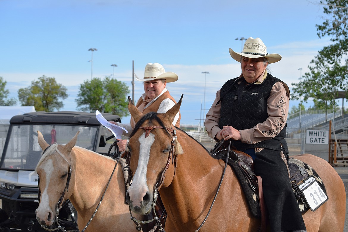 Riders Roxzene Bockstruck (left, on Eddie, formally named Ravenwood Exotic Prize) and Barbara Tibbs (right, on Dusty, formally named Ravenwood Done in Style), all four from northern Idaho, prepare to compete at the Inland Empire Arabian Horse Club’s annual show in Moses Lake at the Grant County Fairgrounds on Saturday. “I’ve been riding since I could walk,” said Tibbs, 68.