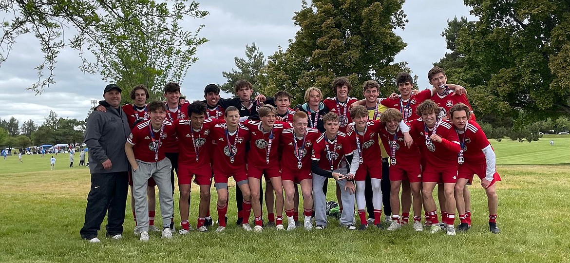 Courtesy photo
The Timbers North FC 2005 boys red soccer team won the U17 boys division this past weekend in the Idaho State Cup tournament at Simplot Fields in Boise, qualifying for the USYS Far West Regional Championships in Boise June 20-26. In Game 1 on Friday, May 27, the Timbers beat Premier Pena 1-0. The lone goal was scored by Cooper Prohaska, assisted by Jett Longanecker. Miles Taylor had the shutout in goal. In Game 2 on Saturday, May 28 the Timbers beat Inferno Copa 5-1. Cooper Prohaska scored four goals and Nate Wyatt scored the fifth goal.  Miles Taylor had five saves in goal. In Game 3 on Saturday, May 28 the Timbers beat the Idaho Rush 3-0. Goals were scored by Caden Thompson, Zachary Olson and Landon Lee, and Miles Taylor had the shutout in goal. In the semifinal game on Sunday, May 29 the Timbers beat the Renegades Academy 4-0. Cooper Prohaska scored a hat trick and the fourth goal was added on a free kick by Evan Dickinson. Nate Wyatt had one assist. Miles Taylor had the shutout in goal. In the championship game on Monday, May 30, the Timbers North and the Boise Timbers tied 2-2, and the Timbers North won 6-5 on penalty kicks. Tied 0-0 at half, Landon Lee scored a goal in the second half for the Timbers North. It was tied 1-1 at the end of regulation. Landon Lee scored another goal in the first 10-minute overtime period, and the Boise Timbers tied it up in the second 10-minute overtime. In the PK shootout, the Timbers North got one each from Cooper Prohaska, Nate Wyatt, Markus Noble, Evan Dickinson, Griffyn Rider and Seth Johnson. Miles Taylor made the game winning save in the shootout. In the front row from left are Jacob Ukich, Isaiah Vakaloloma, Zachary Olson, Griffyn Rider, Caden Thompson, Nate Wyatt, Markus Noble, Chet Hann, Jett Longanecker and Ethan Wood; and back row from left, coach Mike Thompson, Landon Lee, Ashton Ukich, Sebastian Baker, Cooper Prohaska, Seth Johnson, Isaac Fritts, Nicholas Anderson, Miles Taylor, Stirling Roget and Evan Dickinson.