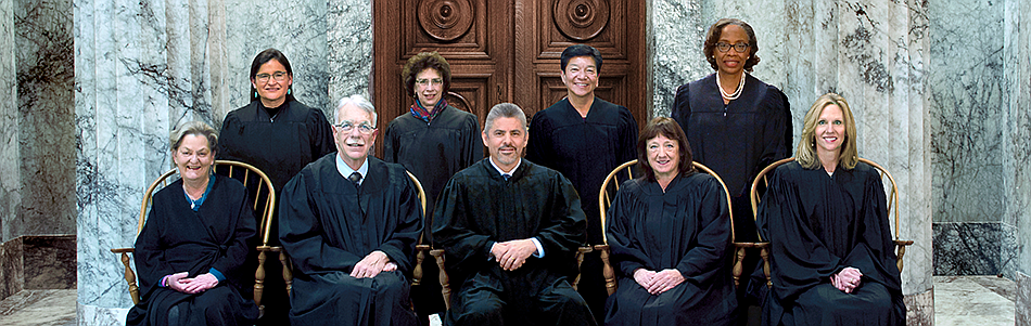 The Washington Supreme Court. From left to right, front: Justice Susan Owens, Associate Chief Justice Charles W. Johnson, Chief Justice Steven C. Gonzalez, Justice Barbara A. Madsen, Justice Debra L. Stephens. Back row: Justice Raquel Montoya-Lewis, Justice Sheryl Gordon McCloud, Justice Mary I. Yu and Justice G. helen Whitener.