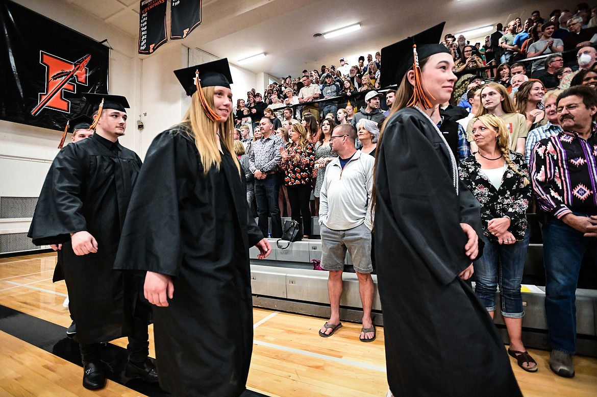 Graduates file into the gymnasium for Flathead High School's Class of 2022 commencement ceremony on Friday, June 3. (Casey Kreider/Daily Inter Lake)