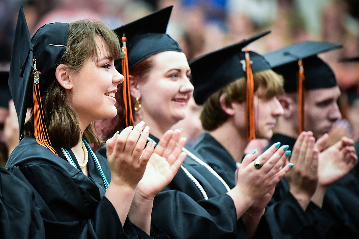 Graduates clap after a musical performance on the marimba by classmate Melody Carhart at Flathead High School's Class of 2022 commencement ceremony on Friday, June 3. (Casey Kreider/Daily Inter Lake)