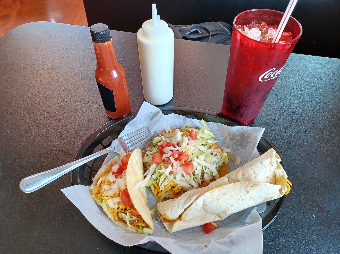 A taco, a tostada and a burrito are what’s for lunch Thursday at The Taco Shop in Moses Lake. The little restaurant still serves the same things it did 45 years ago.