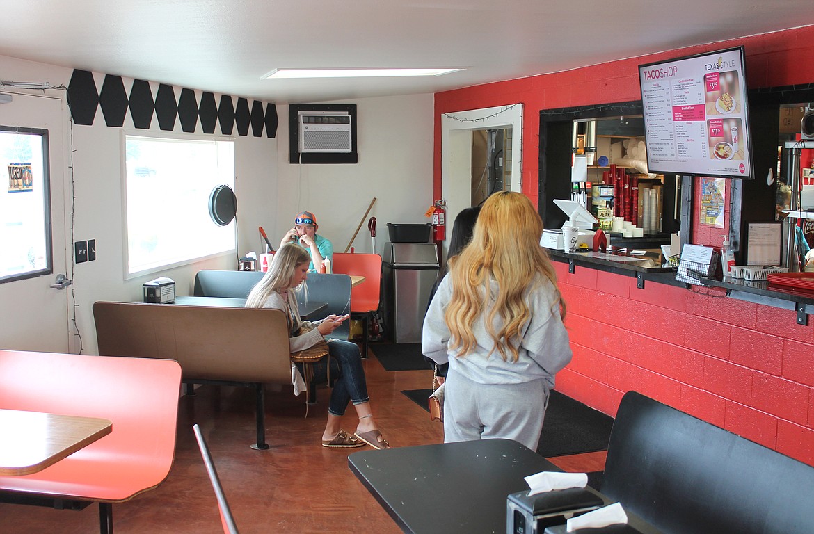 The first customers of the day begin to fill The Taco Shop Friday morning. The 45-year-old eatery has become a fixture in Moses Lake.