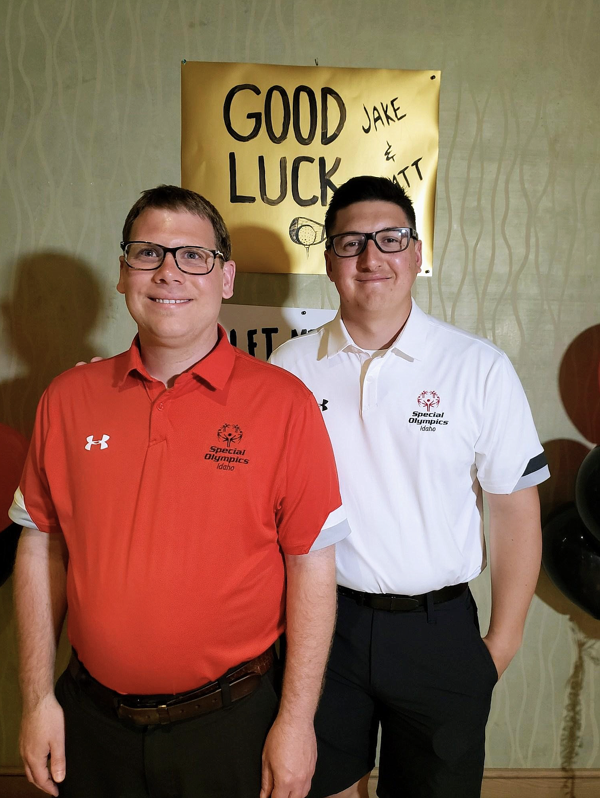 Jake Kerr and Matthew Creighton smile for the camera during their special sendoff party held at the Coeur d'Alene Resort on June 1. The duo are set to represent North Idaho at the Special Olympics USA Games in Orlando, Florida.
