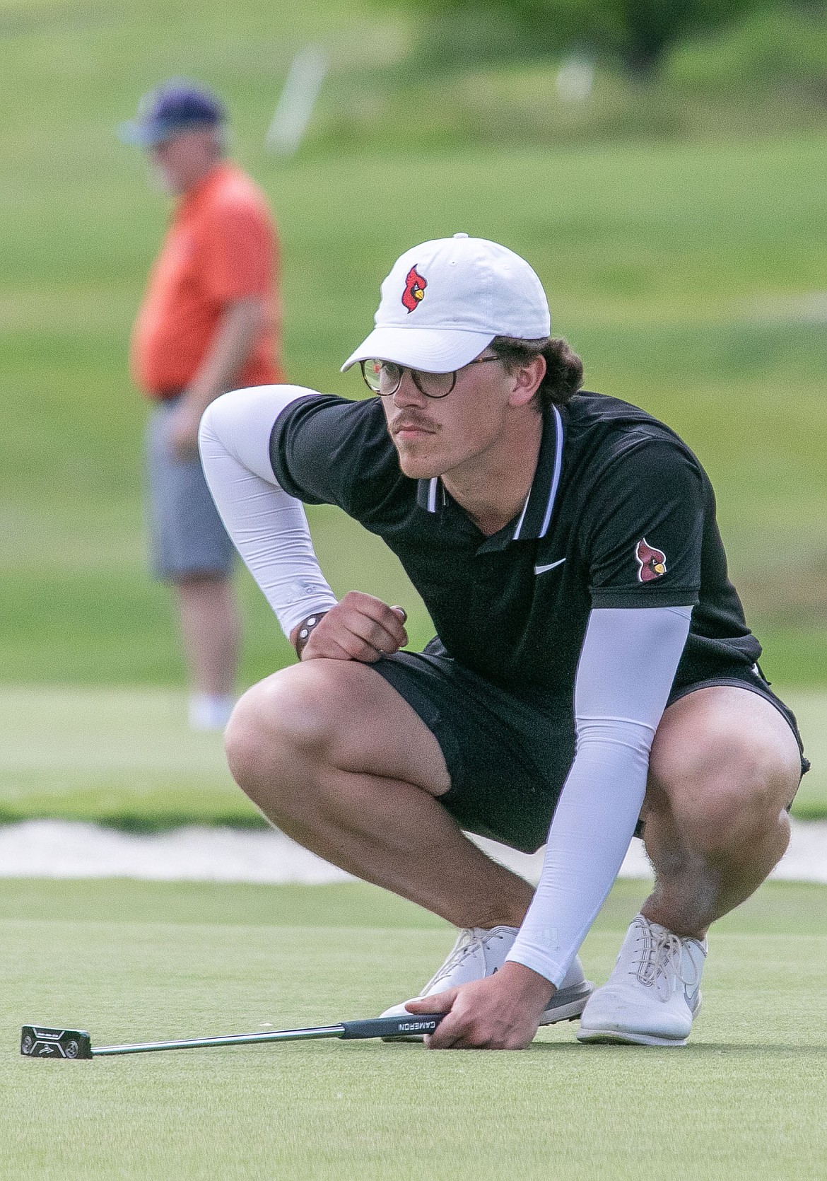 TJ MULLINAX/Northwest Athletic Conference
North Idaho College golfer James Swan eyes his putt during the Northwest Athletic Conference Championships at Apple Tree Golf Course in Yakima.