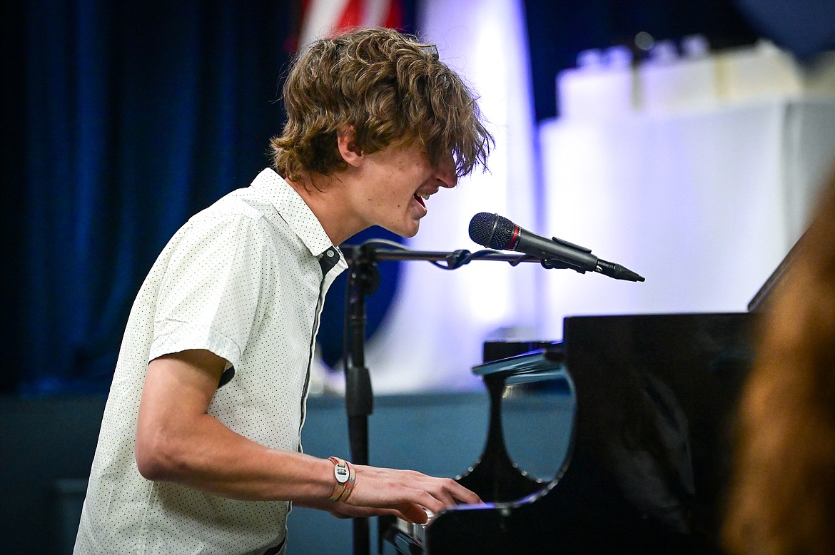 Graduate Josh Mortenson performs the song "Kids" by Ben Rector at Glacier High School's Class of 2022 commencement ceremony on Saturday, June 4. (Casey Kreider/Daily Inter Lake)