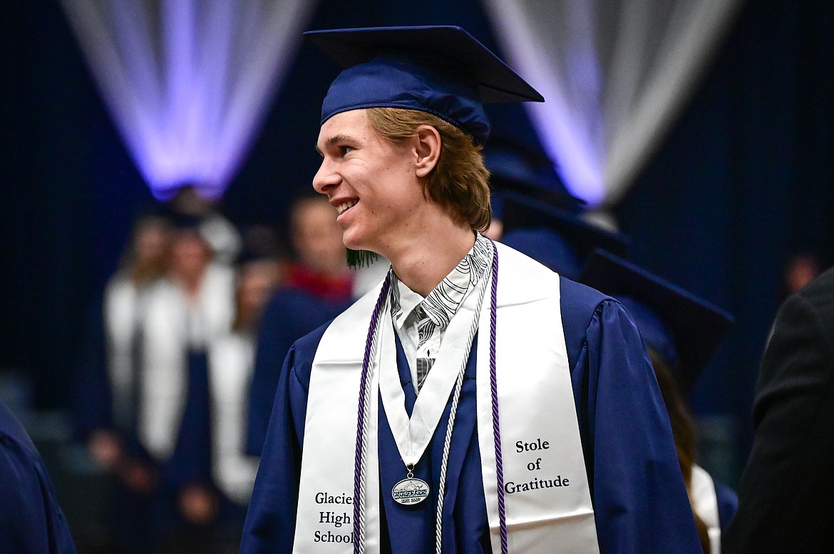 Graduates file into the gymnasium for Glacier High School's Class of 2022 commencement ceremony on Saturday, June 4. (Casey Kreider/Daily Inter Lake)