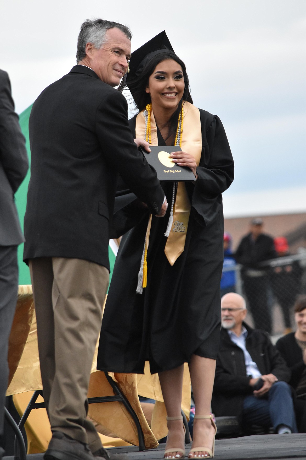 Graduates posed for a picture as they received their diplomas.