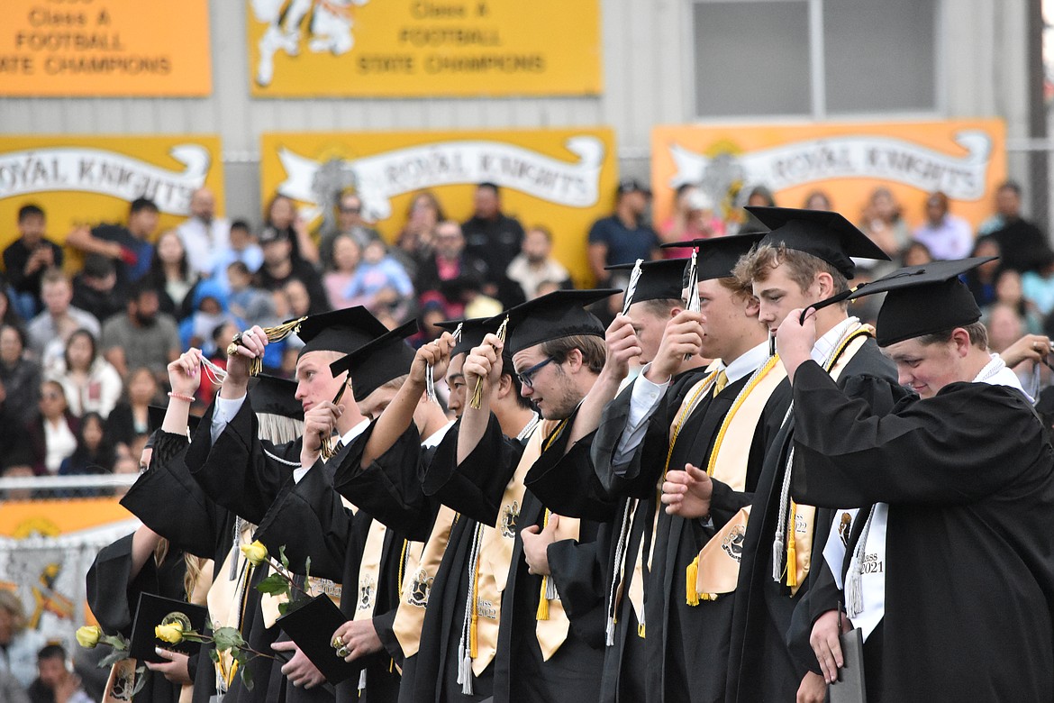 Graduates move their tassels from the right side to the left signifying their graduation from high school. Many will move forward into college and at least two joined the military.