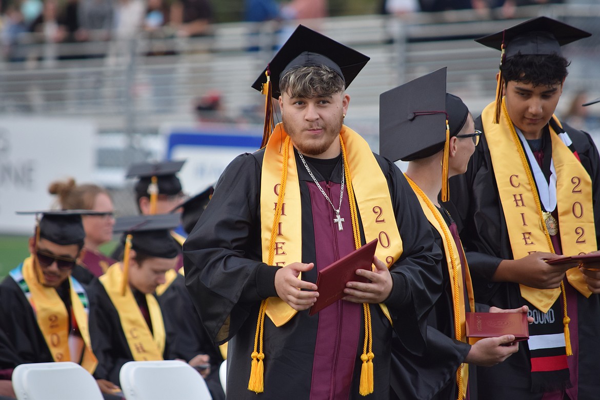 A newly minted MLHS graduate after receiving his diploma on Friday.