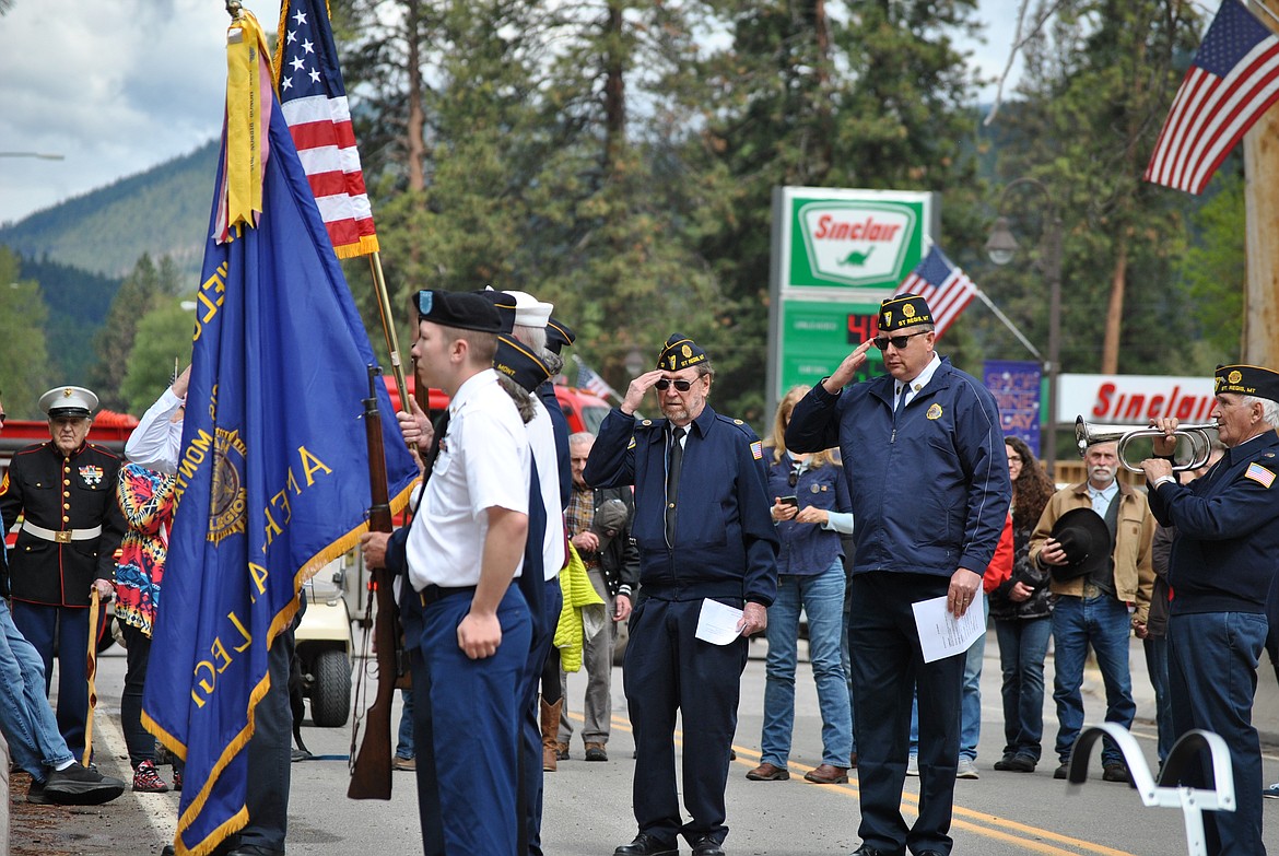 The Ray Welch American Legion Post 13 in St. Regis held their annual Memorial Day services last Monday beginning at Mullan Square. Marching to the bridge over the St. Regis River a wreath of Lilacs, made by Tyler Cheesman, was tossed into the waters below. Taps was played, shots were fired, and a prayer was recited before the procession continued onto the St. Regis Cemetery to conclude their ceremony. (Mineral Independent/Amy Quinlivan)