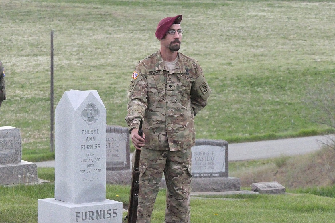 Army veteran and Plains resident Hunter Fields stands at ease during a Memorial Day ceremony this past Monday at the Plains Cemetery.  (Chuck Bandel/VP-MI)