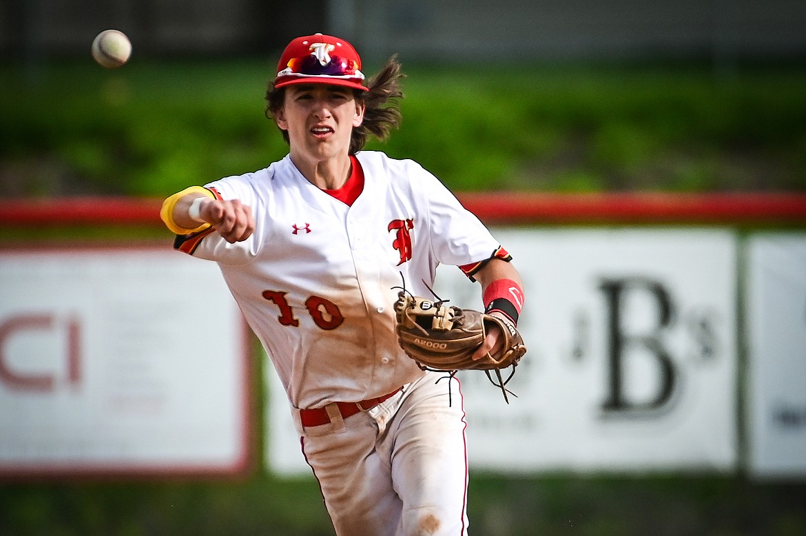 Kalispell Lakers AA shortstop Ostyn Brennan (10) fires to first base against the Missoula Mavericks at Griffin Field on Tuesday, June 7. (Casey Kreider/Daily Inter Lake)