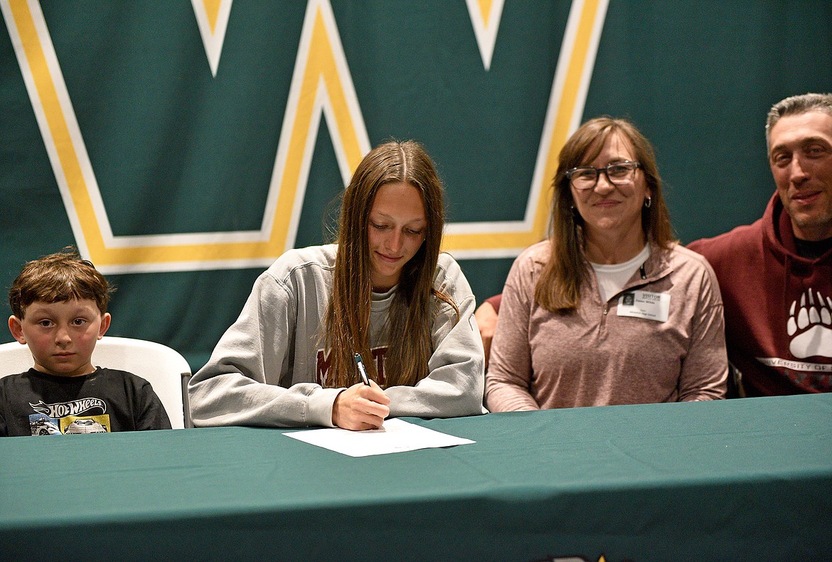 WHS senior Erin Wilde signs with the University of Montana for track and field. (Whitney England/Whitefish Pilot)