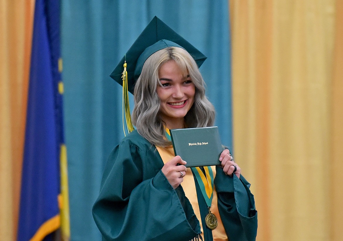 Calie Storm graduates with the Whitefish High School Class of 2022 Saturday during a commencement ceremony at the high school gym. (Whitney England/Whitefish Pilot)