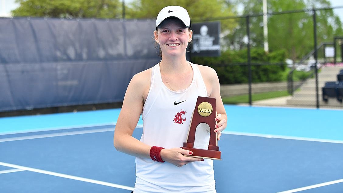 Washington State’s Michaela Bayerlova poses with an award after her quarterfinals matchup in the NCAA Championships in Champaign, Illinois.