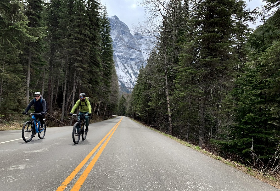 Cyclists make their way up the Going to the Sun Road in Glacier National Park Saturday, May 21, 2022. (Jeremy Weber/Daily Inter Lake)