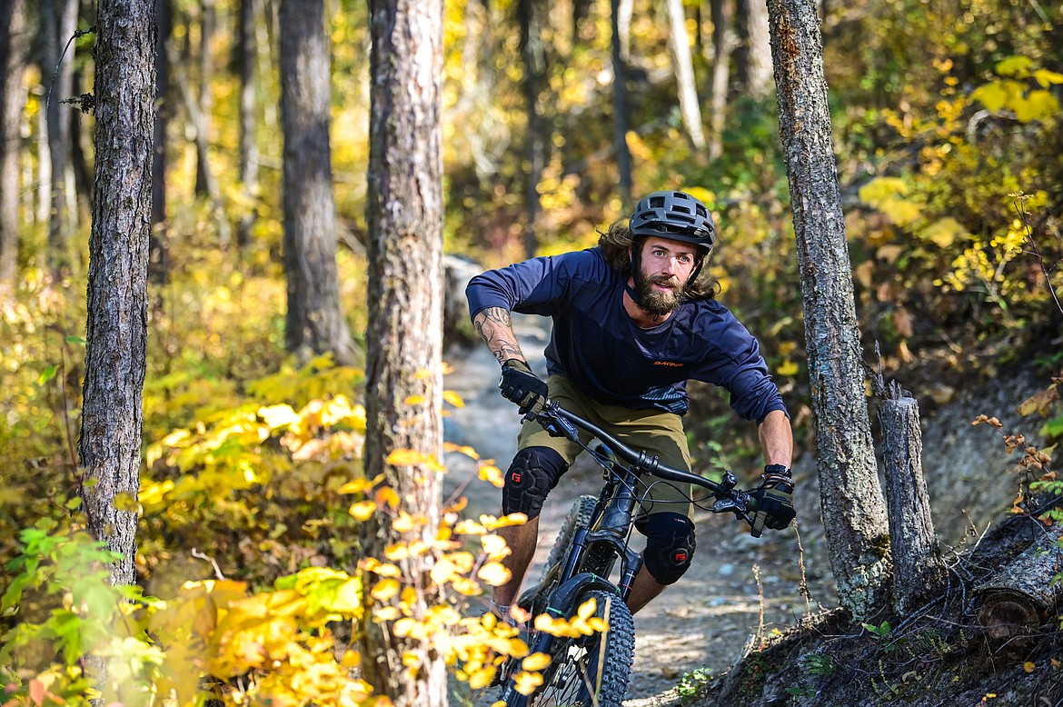 Greg Theis, Executive Director of Flathead Area Mountain Bikers, rides the Big Gulps, Eh? trail near the North Spencer Mountain Trailhead in Whitefish on Thursday, Sept. 30, 2021. (Casey Kreider/Daily Inter Lake)