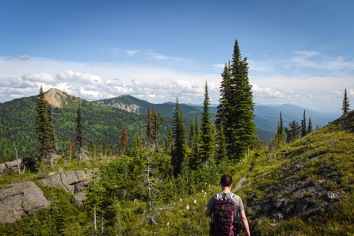 A hiker walks along Sixmile Lookout Trail No. 10 in Flathead National Forest on July 7, 2019. (Casey Kreider/Daily Inter Lake)