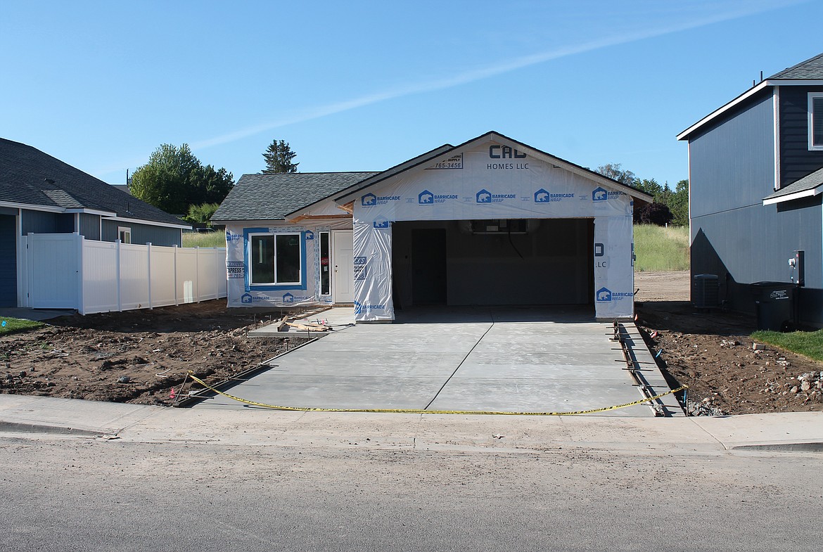 A new home moves nearer to completion in the Warden Heights development. This is one of 18 new homes being built on West Sixth Street in Warden.