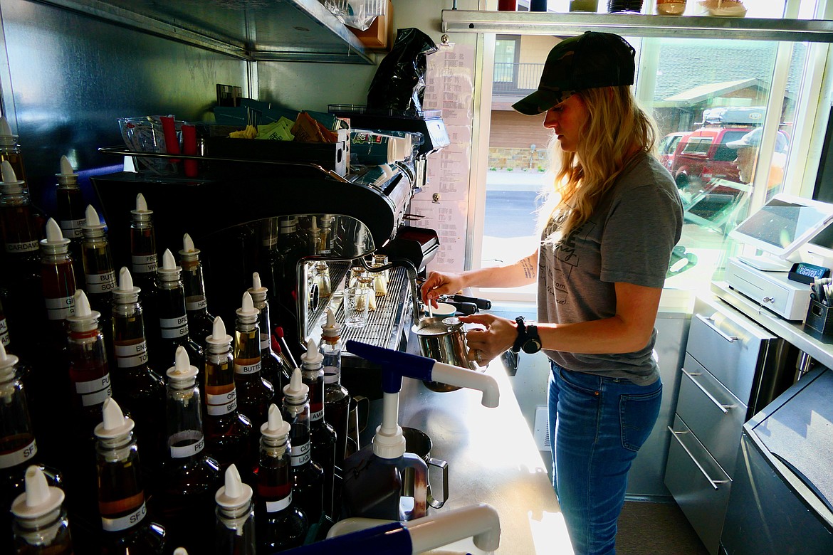 Sam Jochinsen makes an iced coffee at the new Florence Coffee Company location in Whitefish on Thursday, June 9. (Matt Baldwin/Daily Inter Lake)