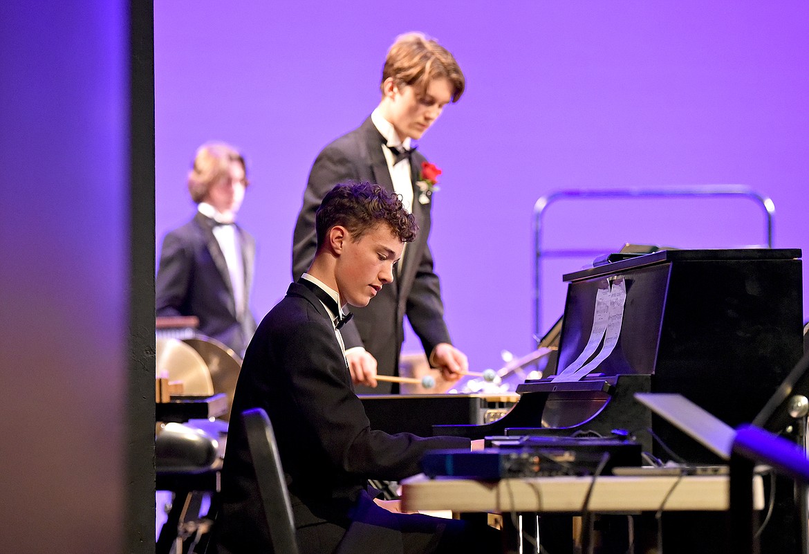 Student musicians Reid Alexander on the piano and Aidan Calaway on the vibraphone play with the Whitefish High School Concert Band during the recent spring concert at the Performing Arts Center. (Whitney England/Whitefish Pilot)