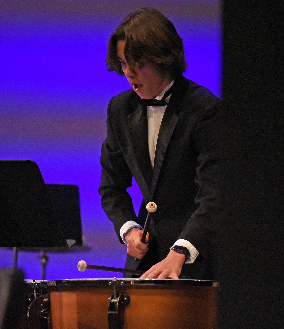 Tristan Shoff on the timpani plays with the Whitefish High School Concert Band during the recent spring concert at the Performing Arts Center. (Whitney England/Whitefish Pilot)