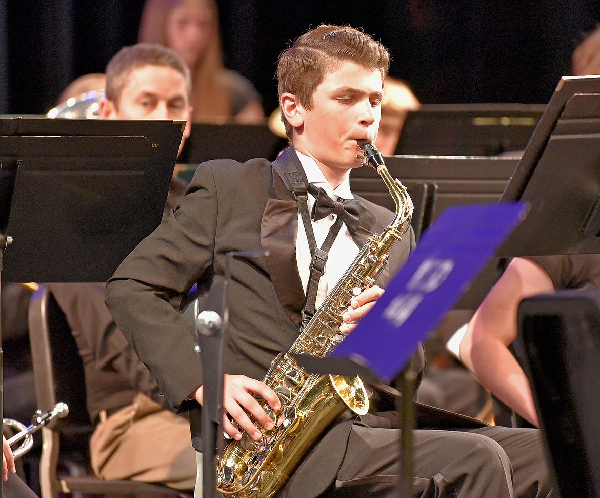 Freshman Ismail Nakonechny plays the alto saxophone with the Whitefish High School Concert Band during the recent spring concert at the Performing Arts Center. (Whitney England/Whitefish Pilot)