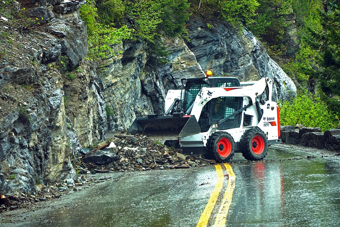 Glacier National Park Road Crew cleaning fallen rocks off the Going-to-the-Sun Road on June 6, 2022. (NPS photo)