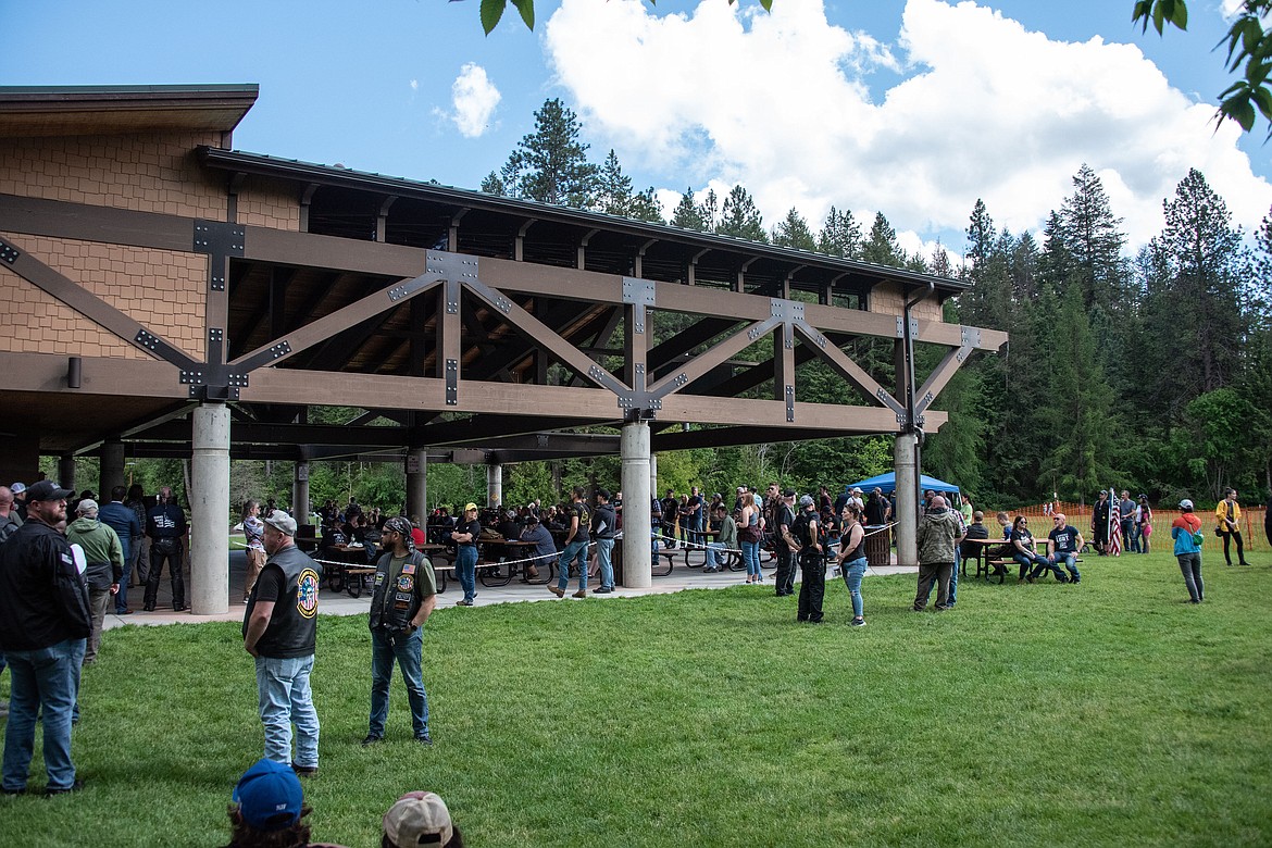 People at the Avista Pavilion in Coeur d'Alene's McEuen Park Saturday listen to speakers during the Panhandle Patriots Riding Club Day of Prayer event.