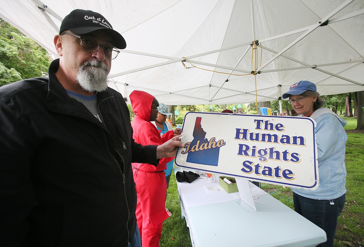 Dave Walker shared his "Idaho, the Human Rights State" sign at the Museum of North Idaho booth during Pride in the Park on Saturday. These signs were made when the Aryan Nations had a large presence in North Idaho in the 1990s.