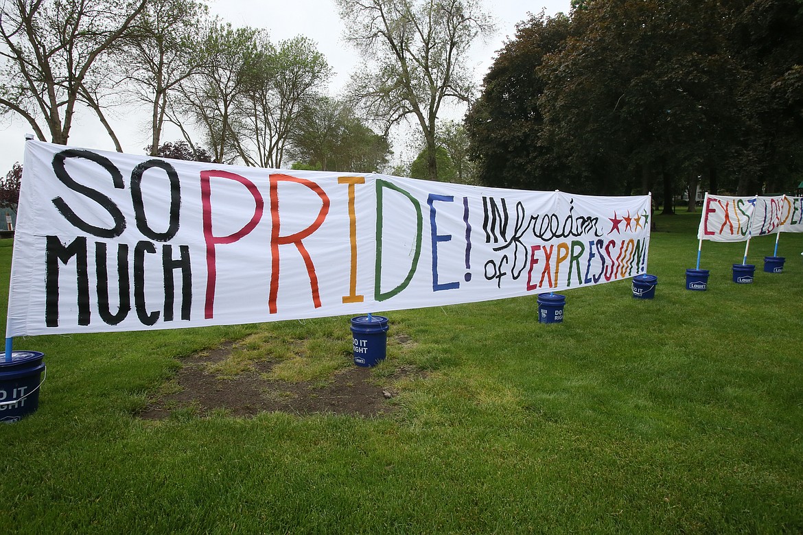 A colorful sign celebrates freedom of expression at the North Idaho Pride Alliance's Pride in the Park event Saturday in Coeur d'Alene.