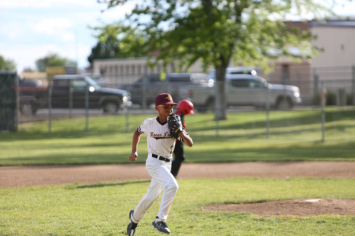 The sunny and warm weather in Moses Lake on Saturday required some players to wear sunglasses.
