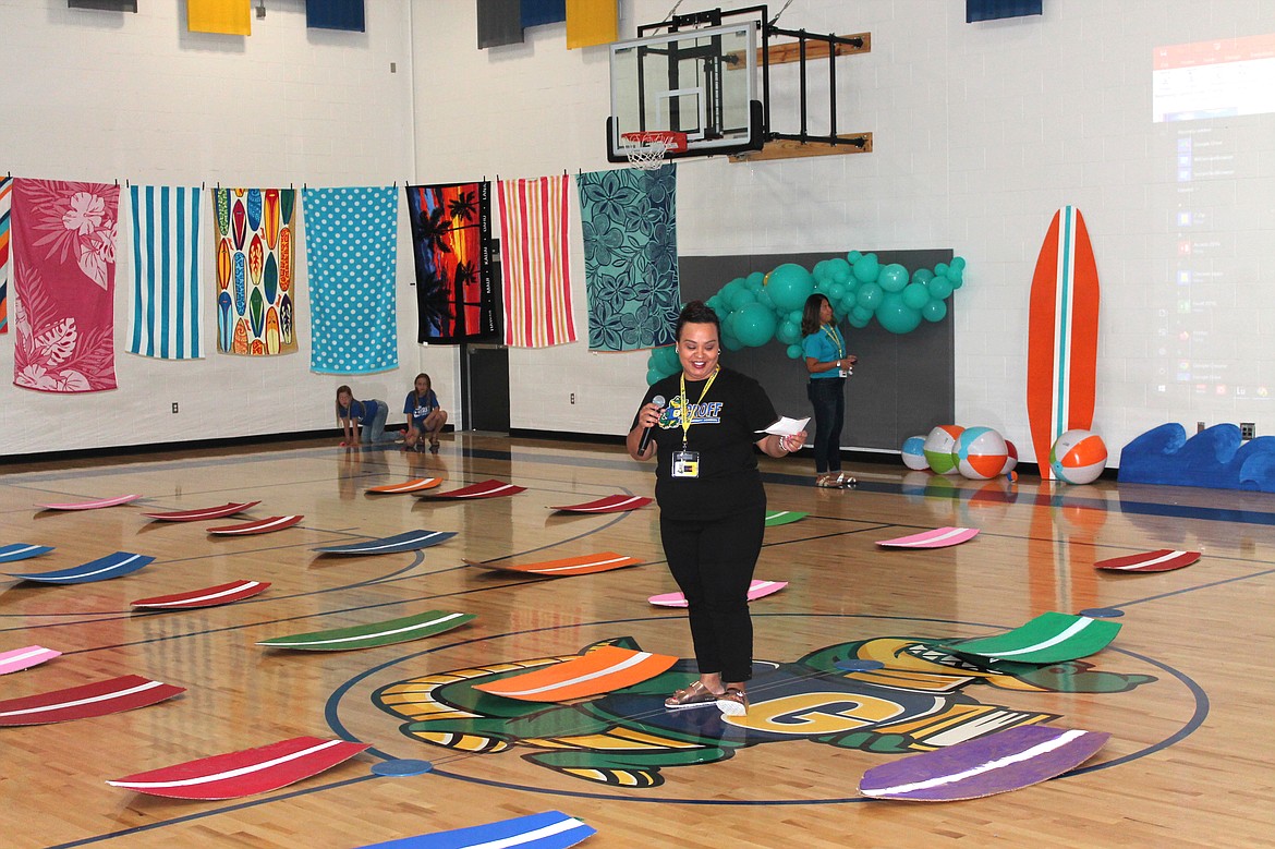 Counselor Jannette Serrano-Vasquez opens the ceremonies at Groff Elementary School's first-ever kindergarten graduation.