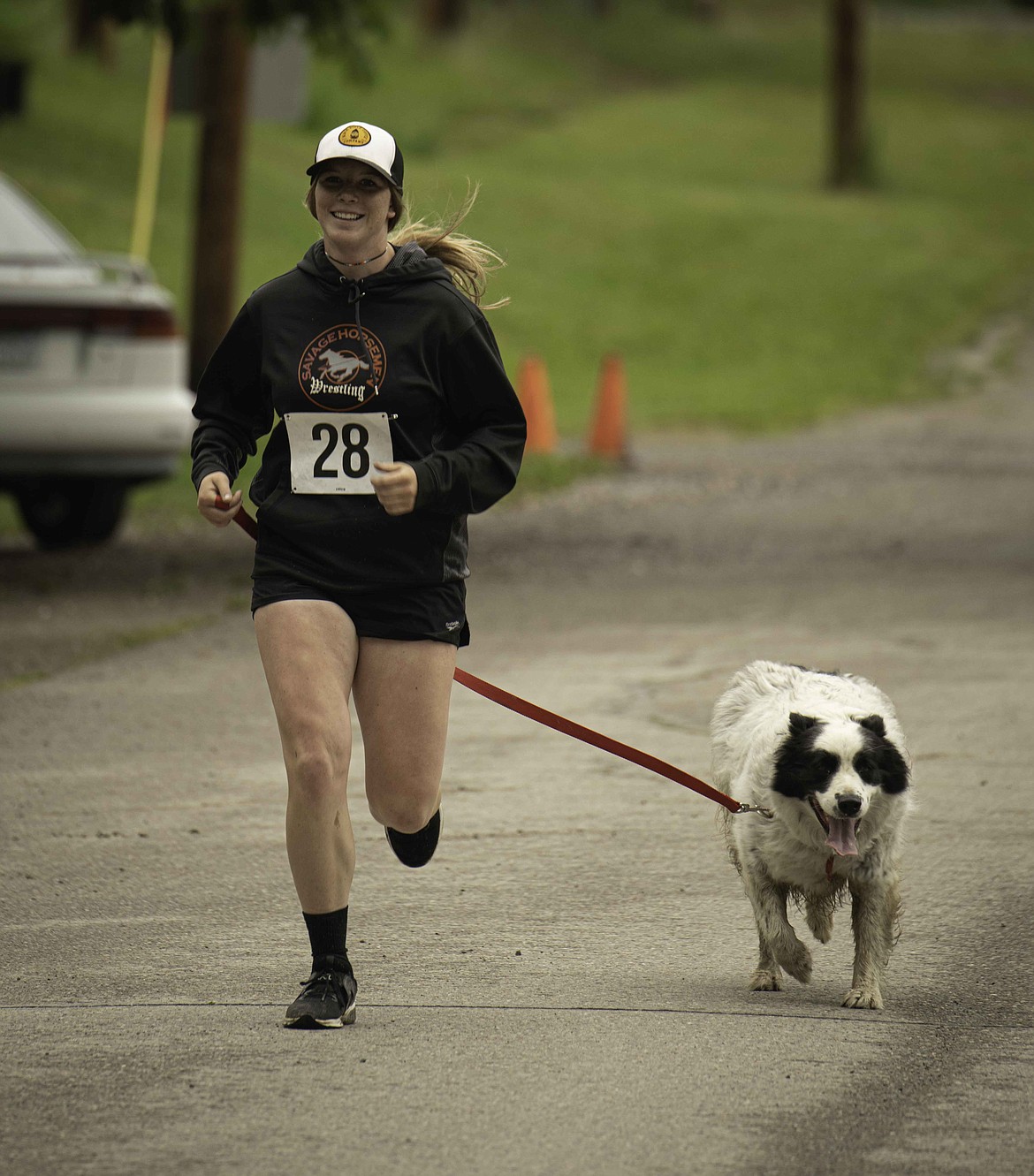 Josie Uski and dog Bandit in 3K race. (Tracy Scott/Valley Press)